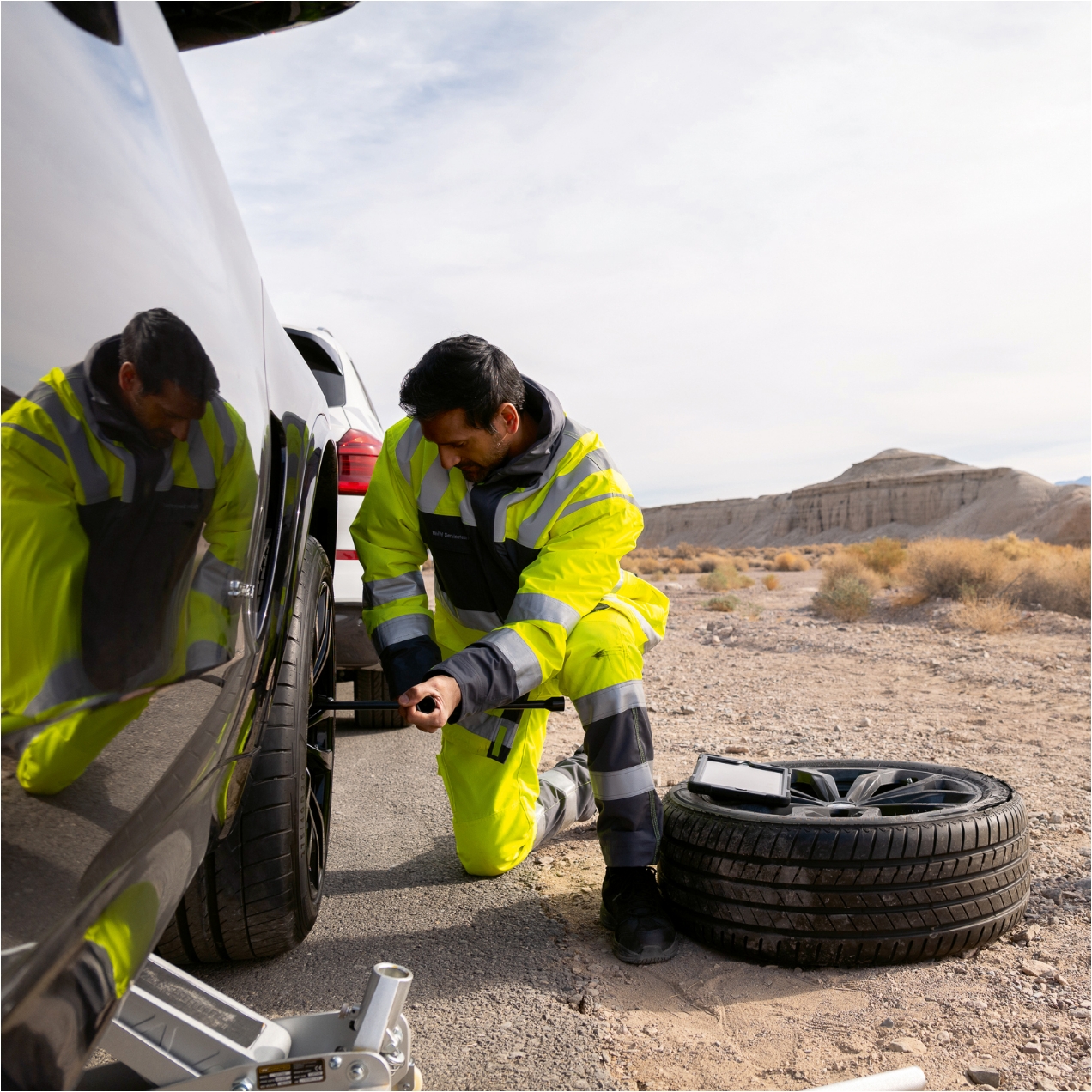Someone changing a tire